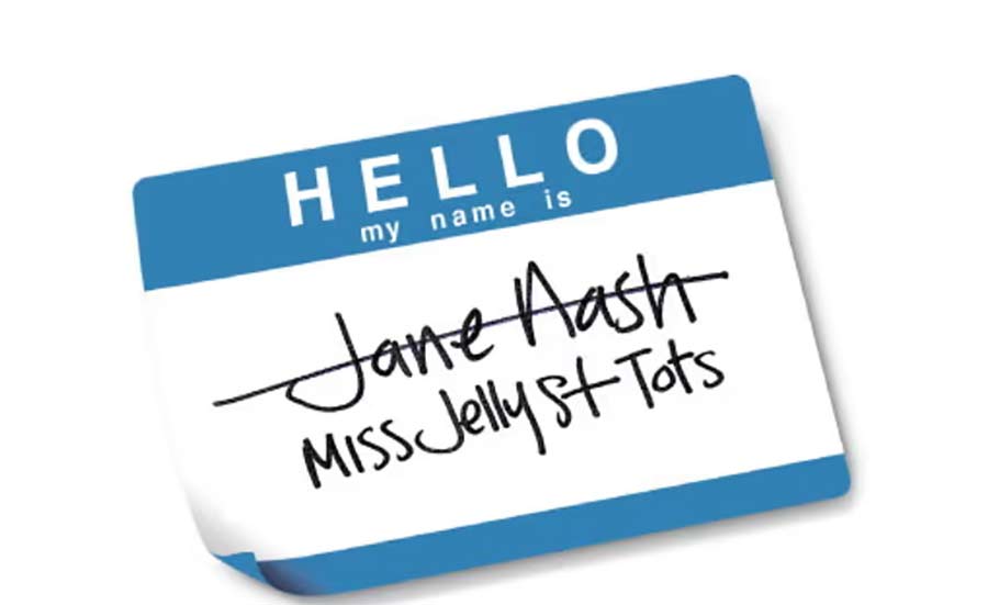 Close-up of a name tag stating "Hello, my name is Jane Aash."